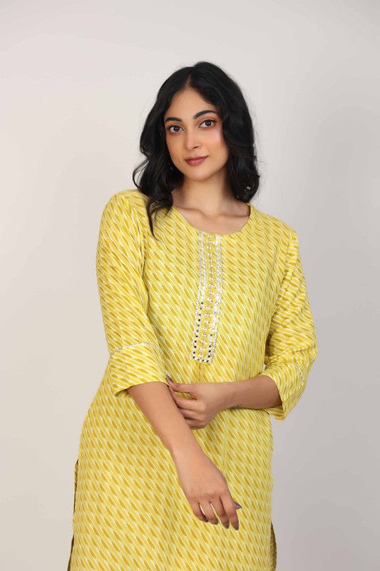 Yellow 3/4th Sleeves Rayon All over print and Neck placket thread work with tassels Calf length Kurta