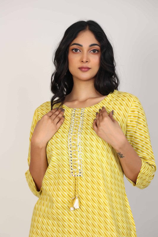 Yellow 3/4th Sleeves Rayon All over print and Neck placket thread work with tassels Calf length Kurta